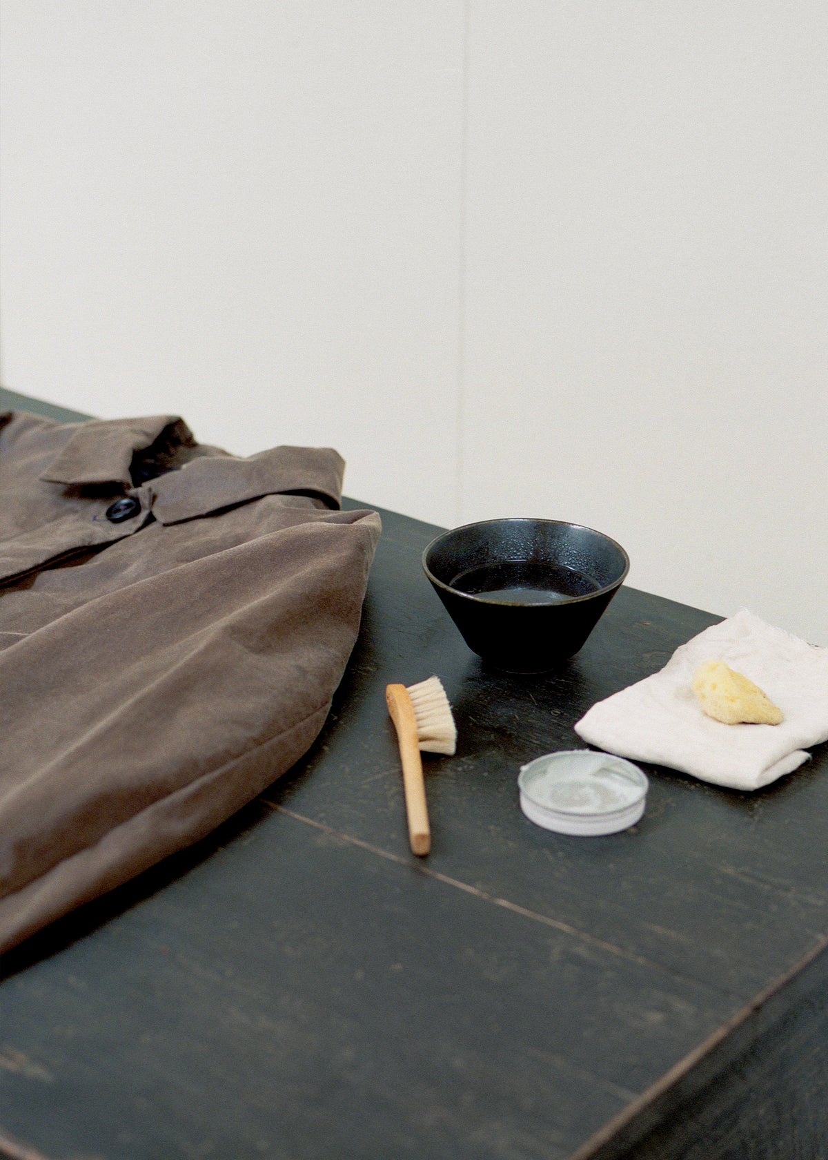 Re-wax oilskin service