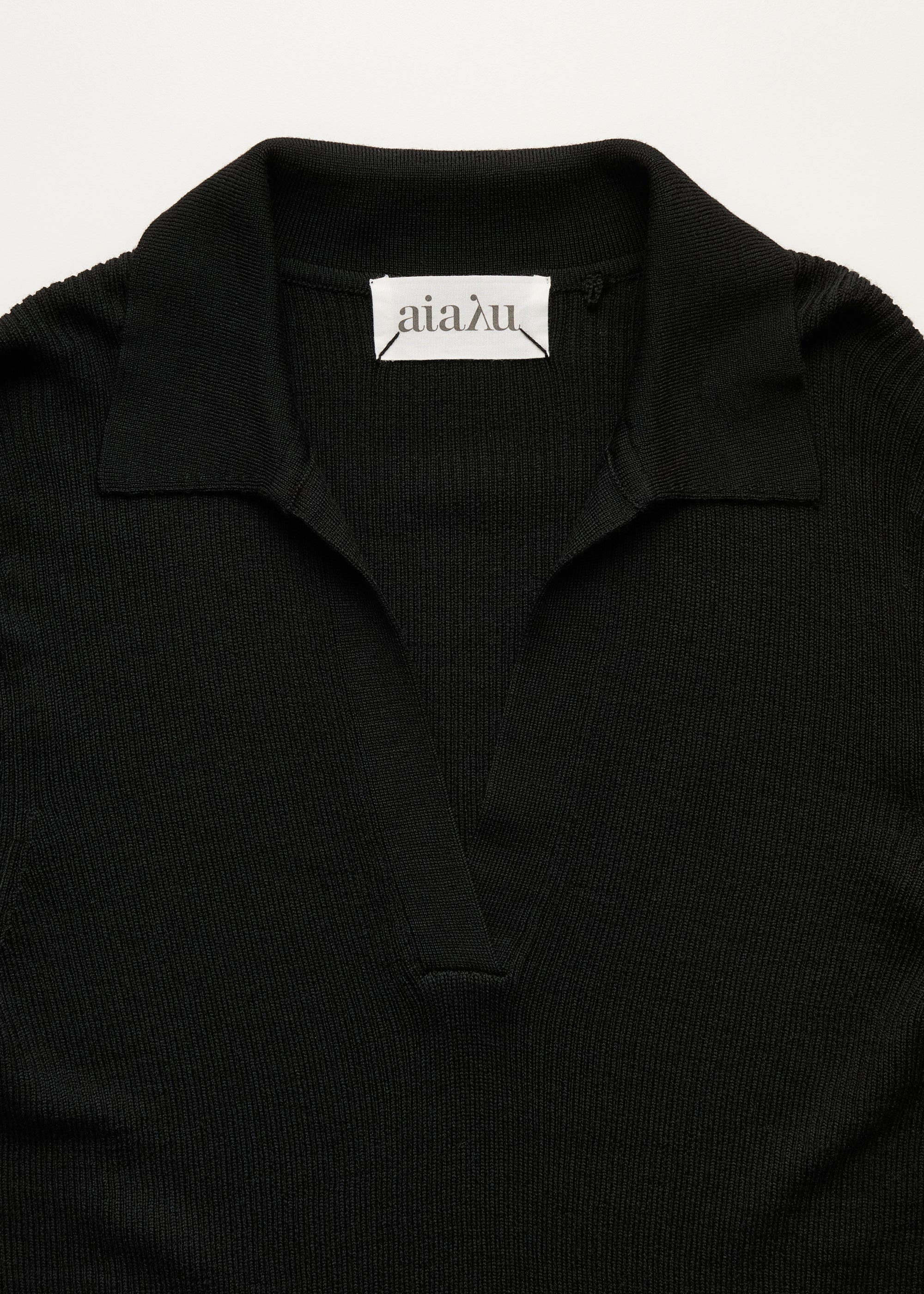 Noa polo blouse – pure merino wool | Black Blouse aiayu